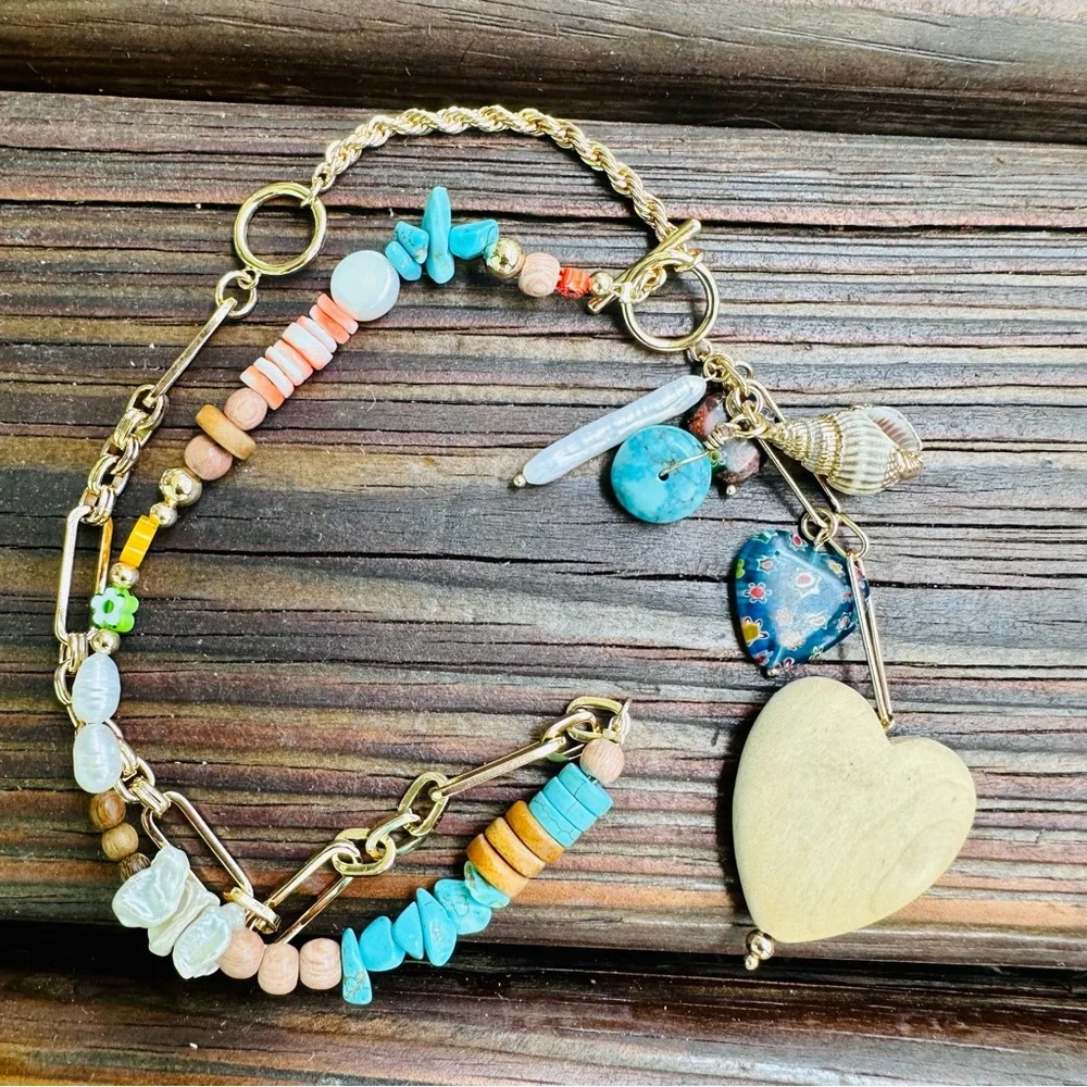 Anthropologie femininity venetian seashell
